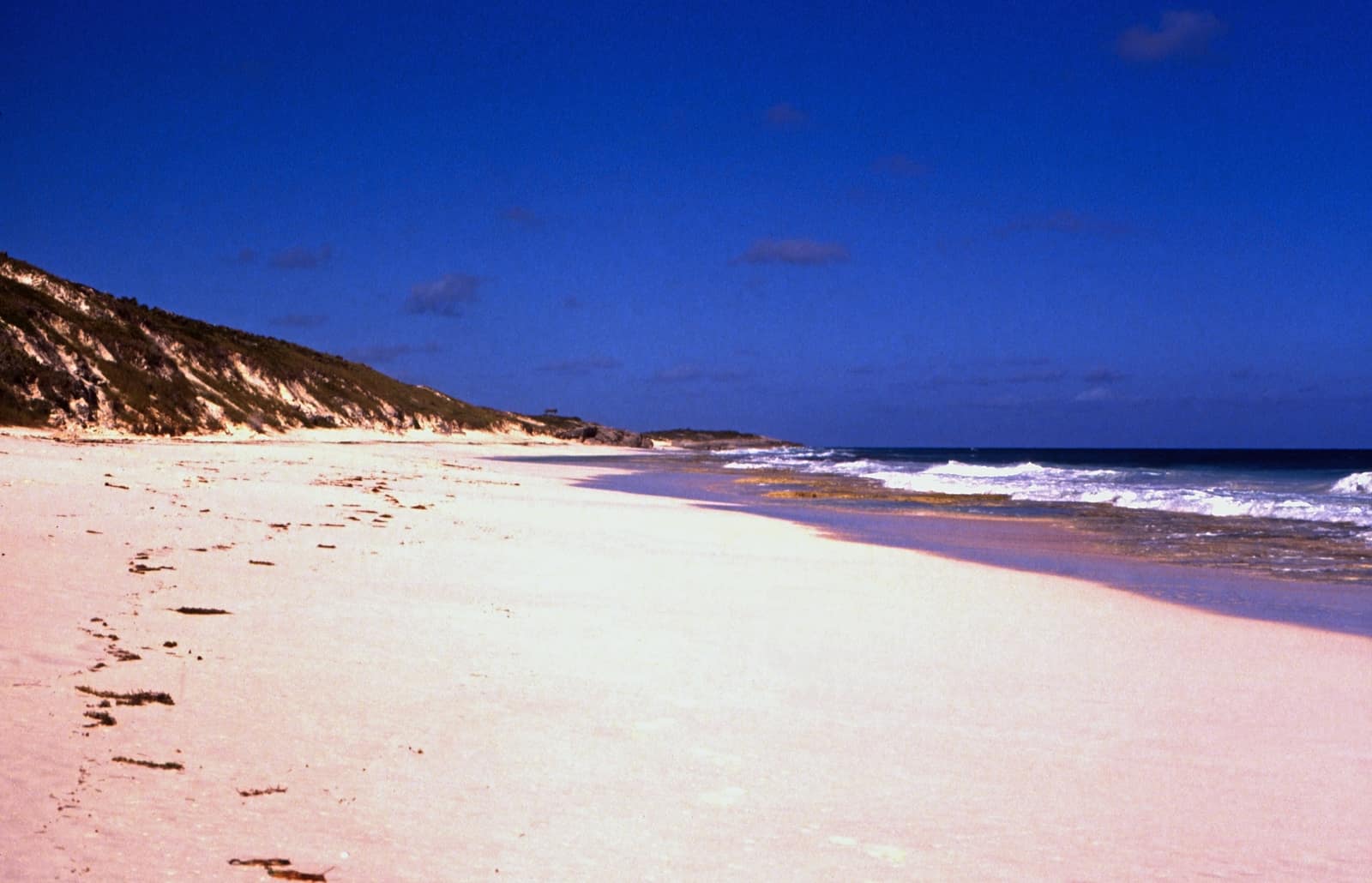 A sand spit running out into the shallows off Stocking Island.