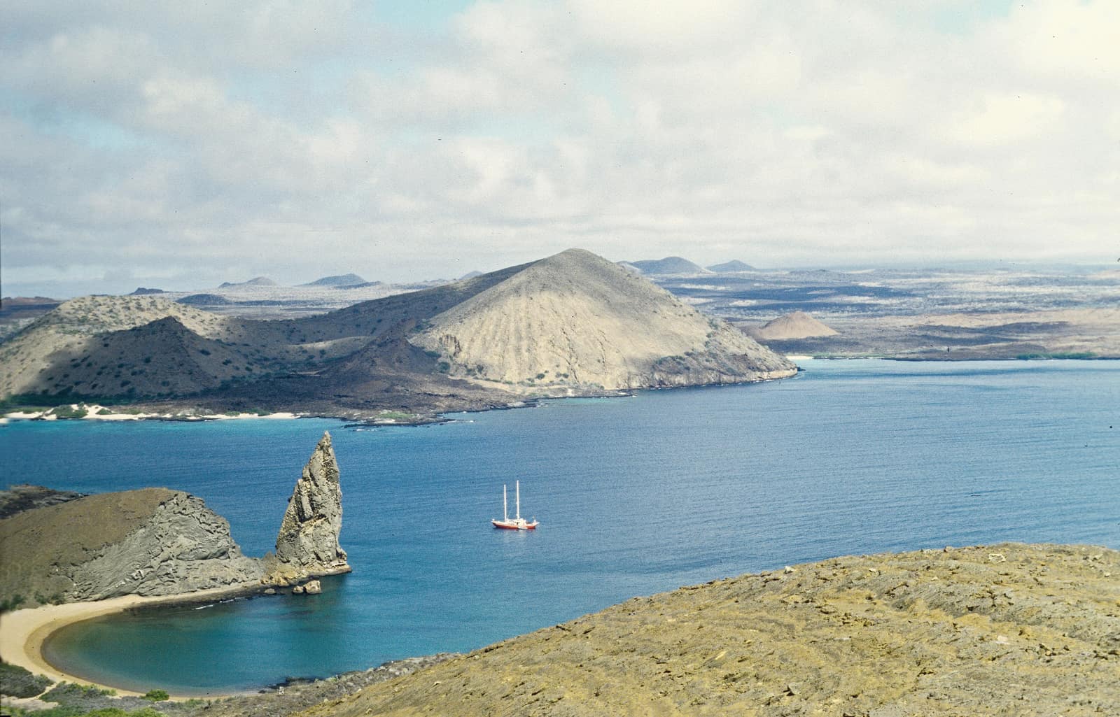 Pinnacle Rock and the twin bays of Bartolomé, with Santiago beyond.