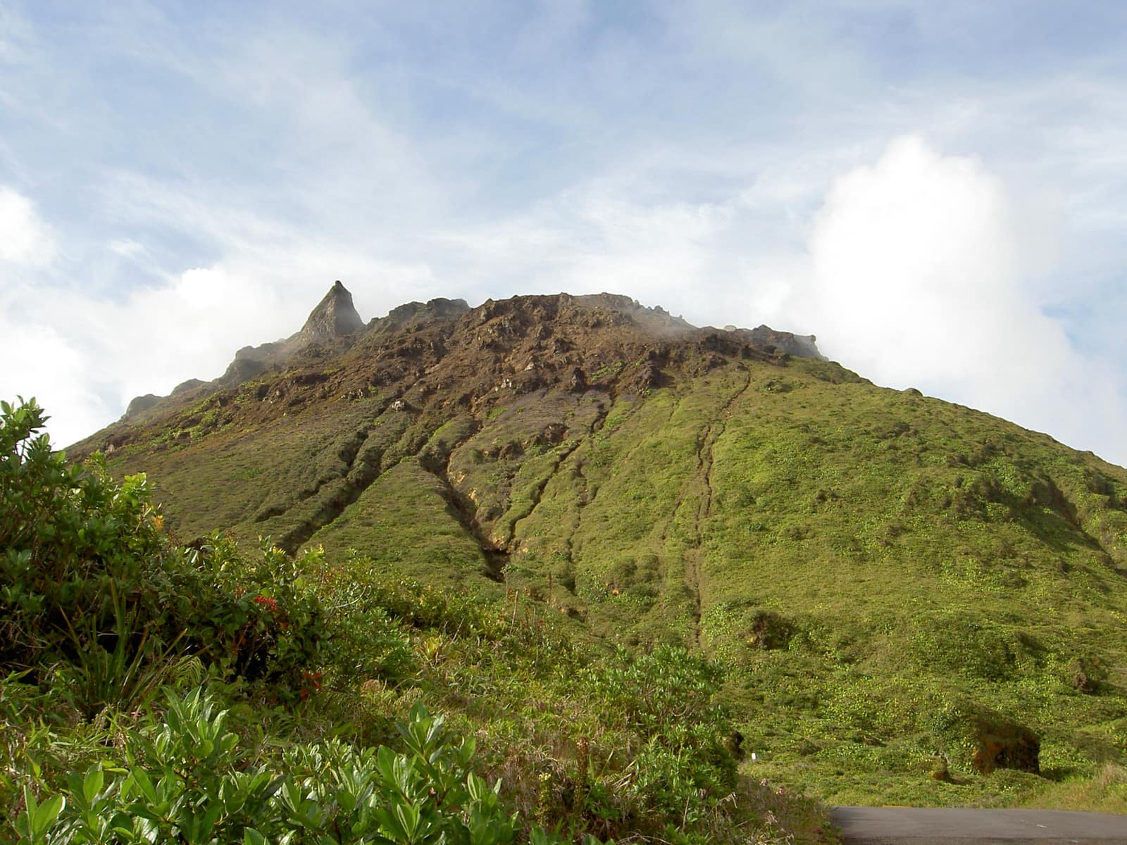 The fractured summit dome of La Soufrière in cloud.