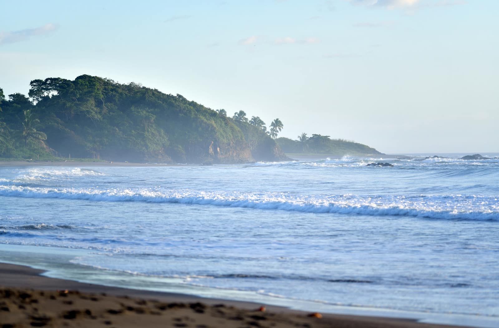 Rock headlands and surf along the Nicoya Pacific coast.