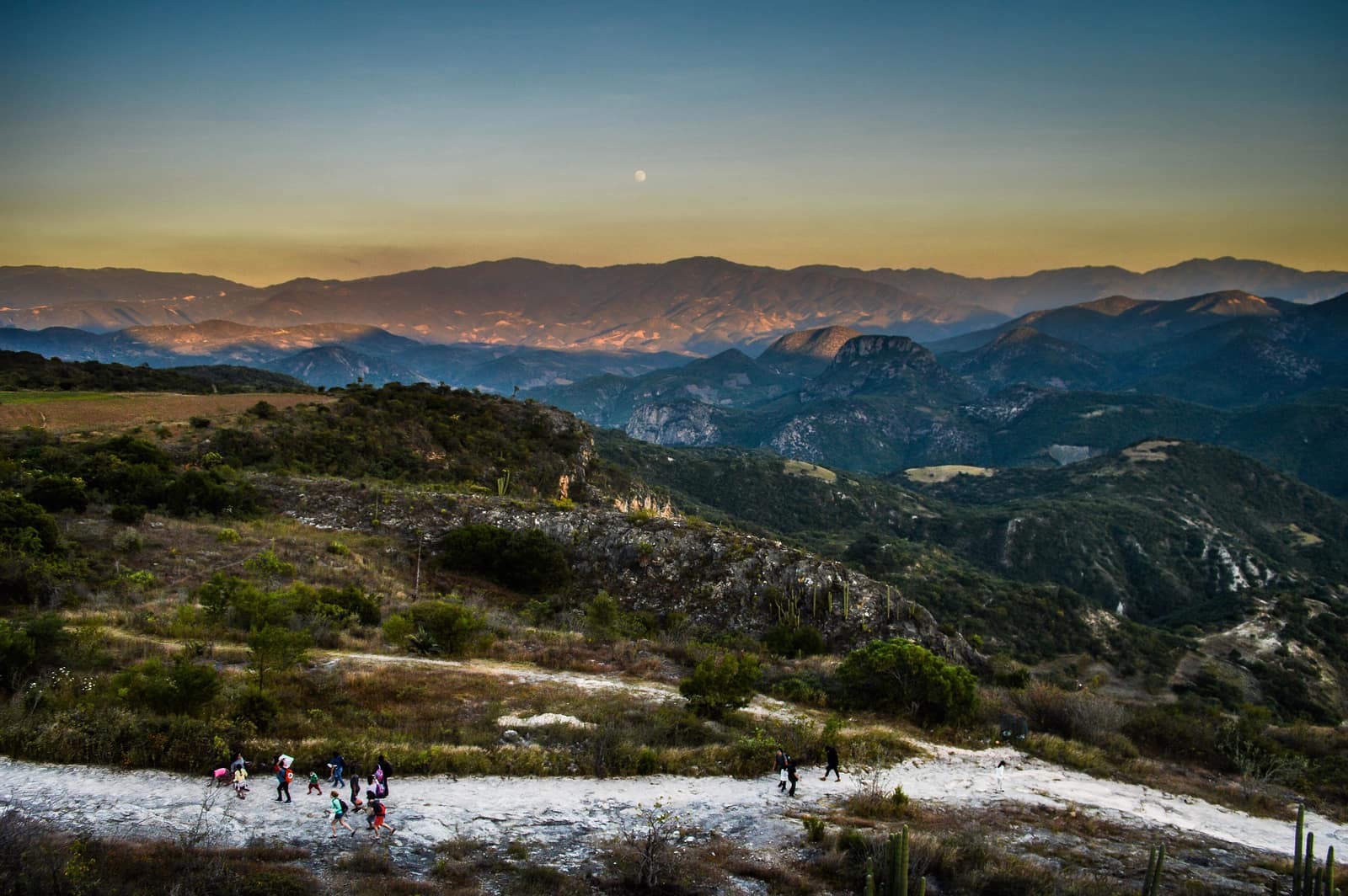 The Oaxacan sierra falling away below the mineral terraces at Hierve el Agua.